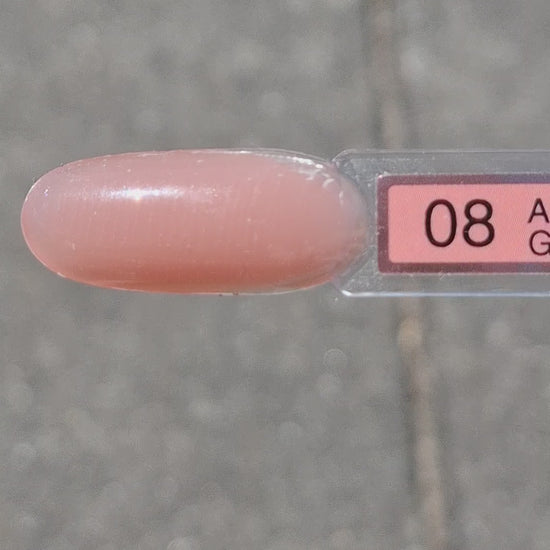 Quida Acrylgel 8 Kyla - warm beige peach acrylgel tube 60gr in het zonlicht, textuur en consistentie zichtbaar