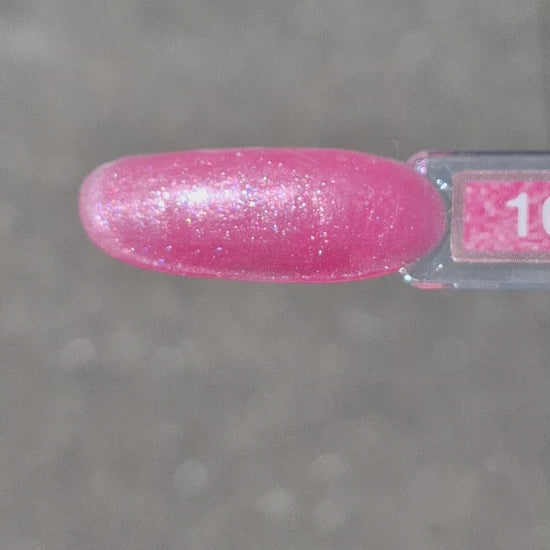 Quida Buildergel 10 Rose Quartz - intens fuchsia-roze shimmer hard gel buildergel in het zonlicht, textuur en consistentie zichtbaar 30gr