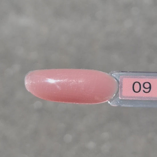 Quida Acrylgel 9 Zoë - diepe roodbruin acrylgel tube 60gr in het zonlicht, textuur en consistentie zichtbaar